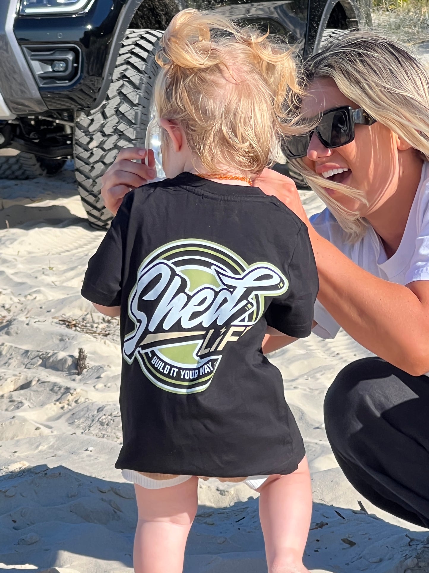 Groms matching green tee!